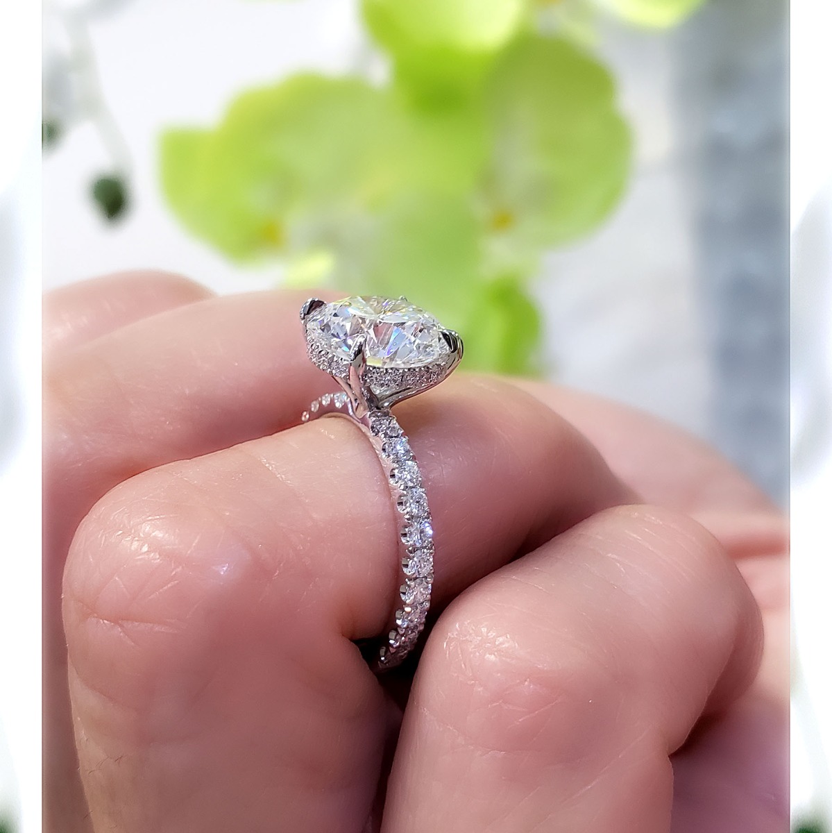 Hidden Halo Engagement Ring on Hand
