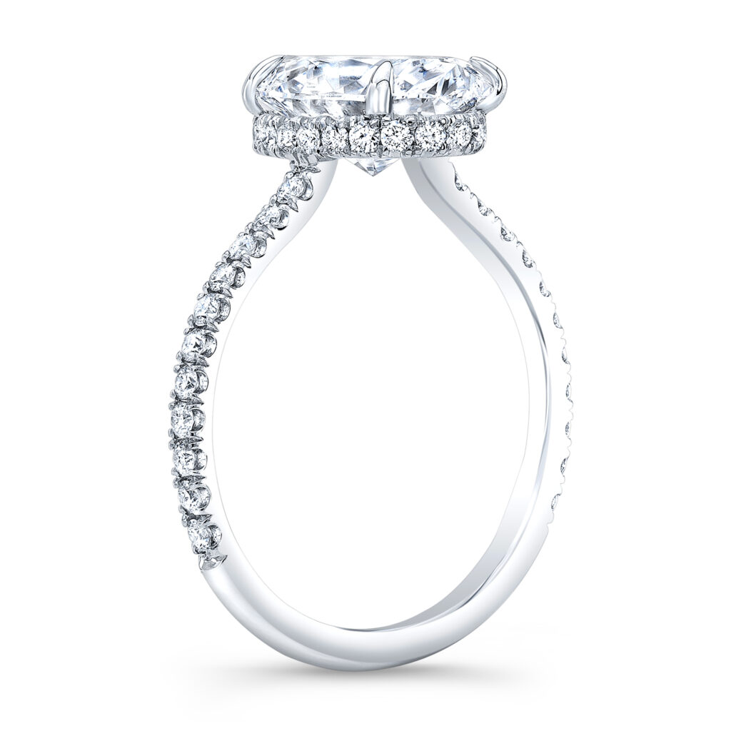 The natural diamond takes center stage in this captivating ring. The under halo design adds an enchanting touch, making it a perfect choice for a proposal